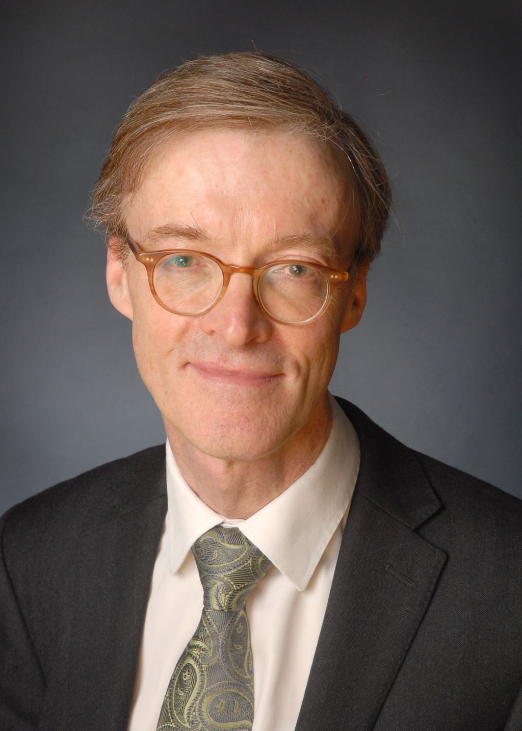 A photograph of Mark Green, Director of Finance and Business Improvement