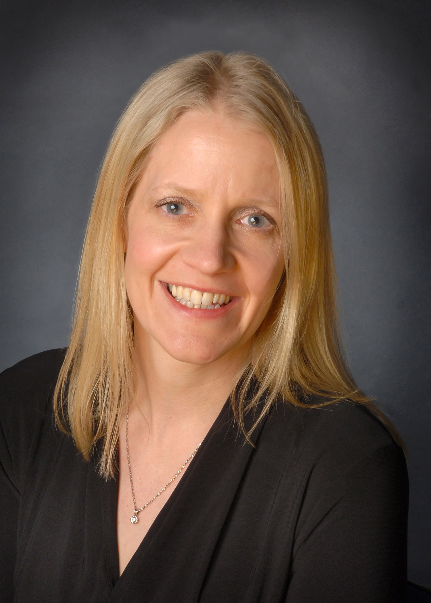 A photograph of Angela Woodhouse, Director of Strategy, Insight and Governance